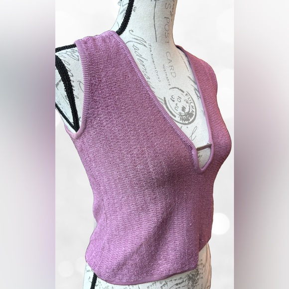Knit Midriff Top with Plunge Neckline
EUR 44 (runs small)
Like New / Never Worn - Picture 3 of 8